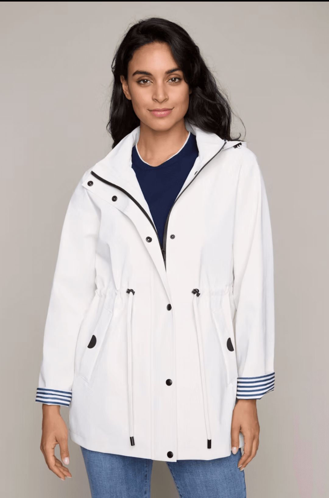 Raincoat in Ivory available at Mildred Hoit in Palm Beach.