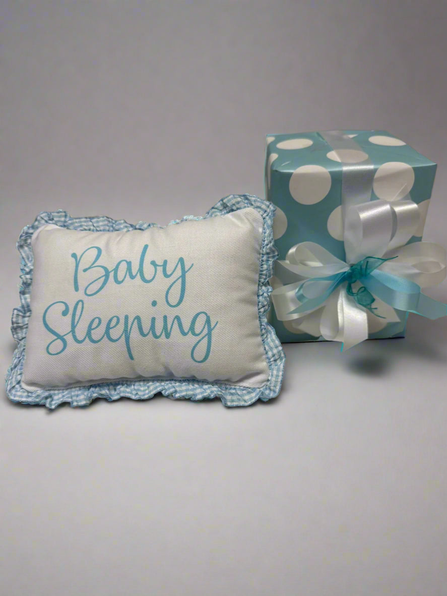 Baby Sleeping Door Pillow in Blue with wrapped gift