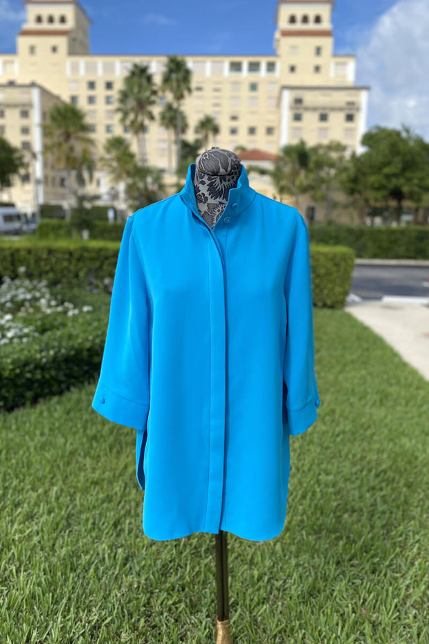 Emmelle Luxurious Crepe Tunic in Turquoise available at Mildred Hoit in Palm Beach.