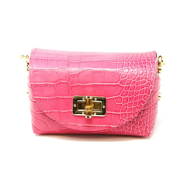 Small Leather Handbag in Fuschia available at Mildred Hoit in Palm Beach.