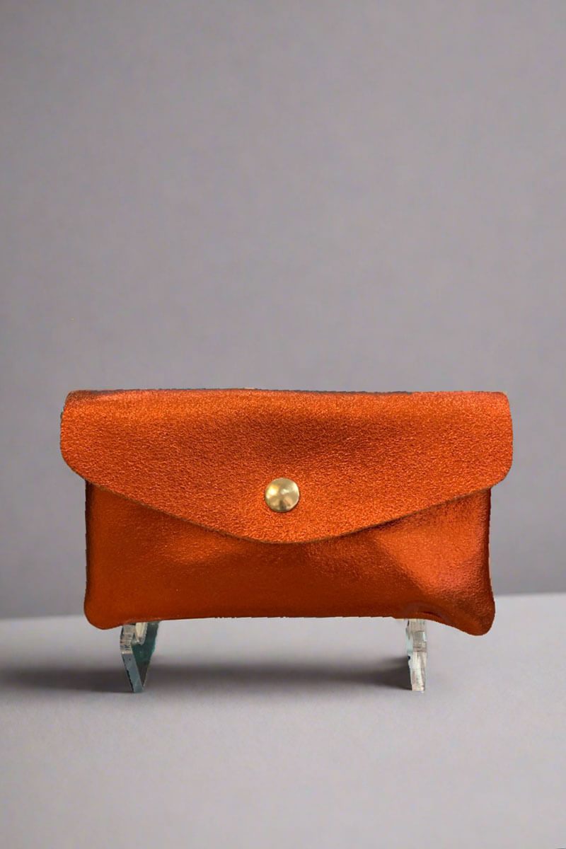 Tourance Metallic Orange Wallet available at Mildred Hoit in Palm Beach.