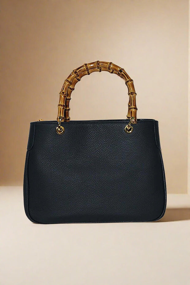 Italian Deerskin Handbag With Bamboo Handles in Black available at Mildred Hoit in Palm Beach.