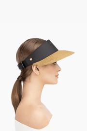 Eric Javits Champ Visor in Natural and Black available at Mildred Hoit in Palm Beach.