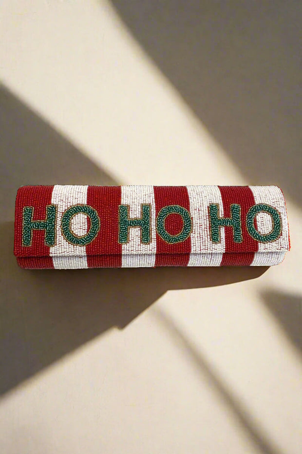 'Ho Ho Ho' Beaded Clutch Bag available at Mildred Hoit in Palm Beach.
