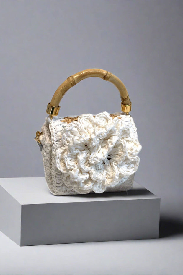 Crochet Flower Mini Bag in White available at Mildred Hoit in Palm Beach.