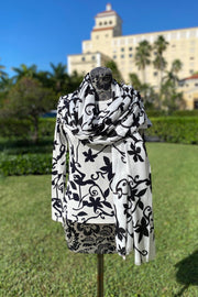 Pashma Black and White Floral Sweater with Scarf at Mildred Hoit in Palm Beach.
