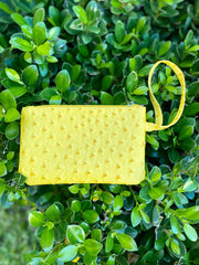 Wristlet Bag - Yellow available at Mildred Hoit in Palm Beach.