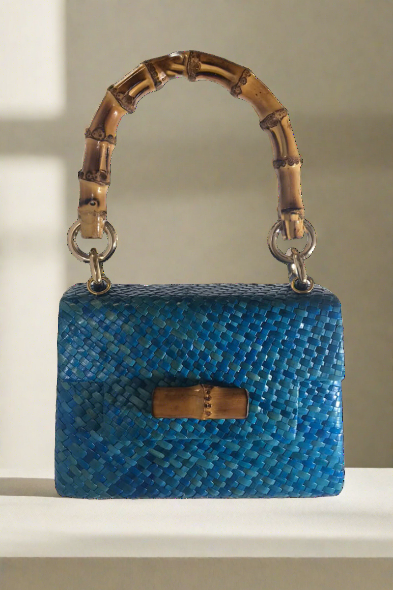 Stella Straw Handbag in Blue available at Mildred Hoit in Palm Beach.