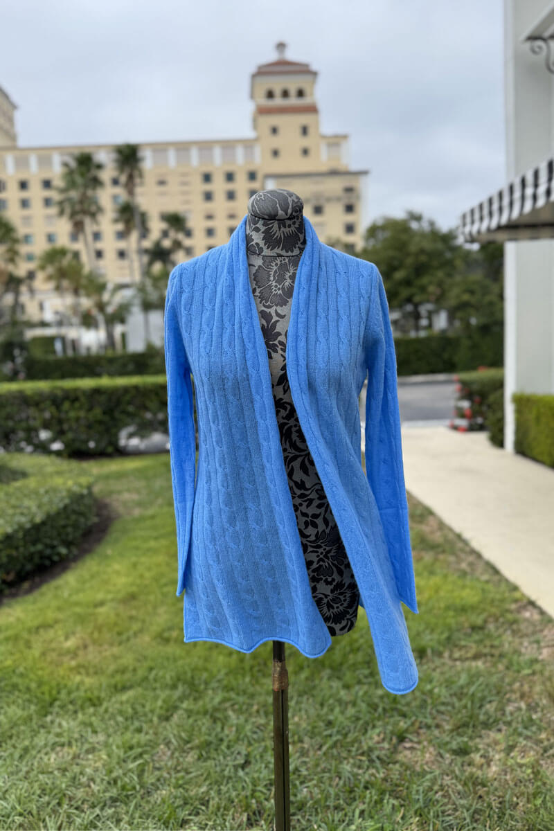 Alashan Cable Knit Duster in Splash available at Mildred Hoit in Palm Beach.