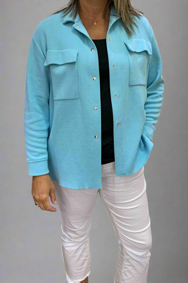 Base Cargo Sweater in Aqua available at Mildred Hoit in Palm Beach.