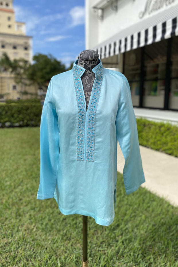Bella Tu Kara Tunic in Pool available at Mildred Hoit.