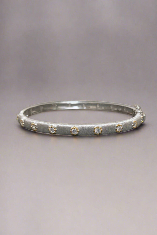 Narrow Rhodium, Crystal, and Gold Bracelet available at Mildred Hoit in Palm Beach.