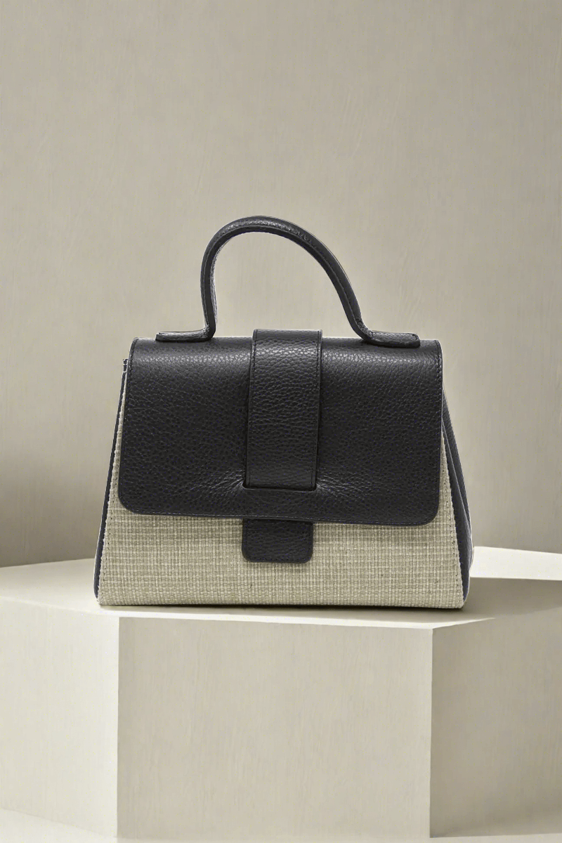 Leather and Rafia Bag in Black available at Mildred Hoit.