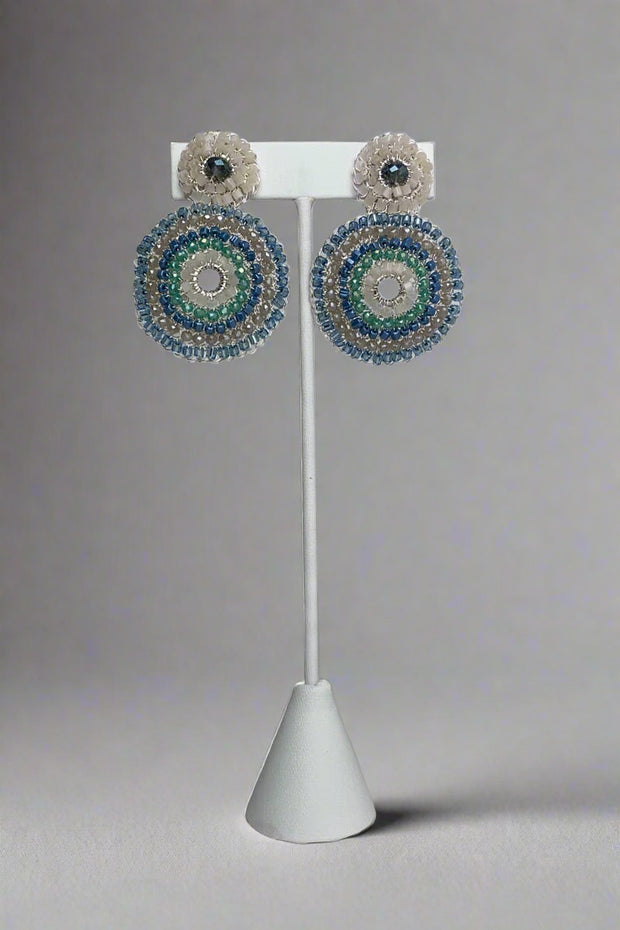 Blue and White Beaded Circular Earrings available at Mildred Hoit in Palm Beach.