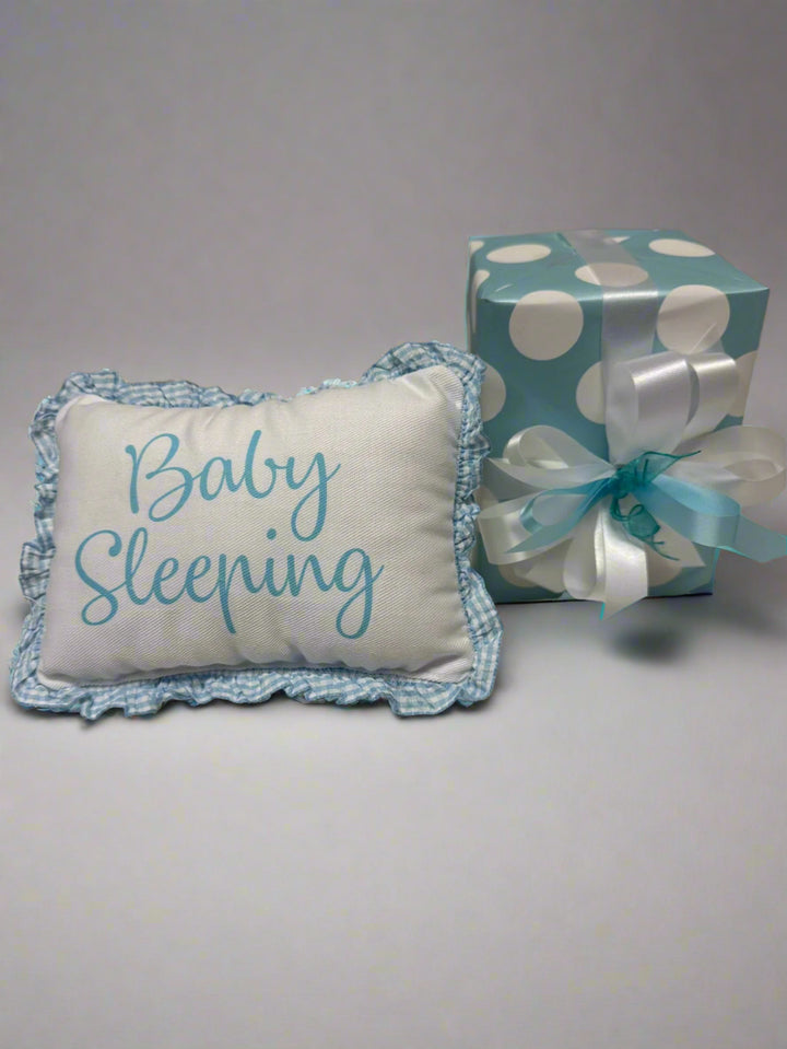 Baby Sleeping Door Pillow in Blue with wrapped gift