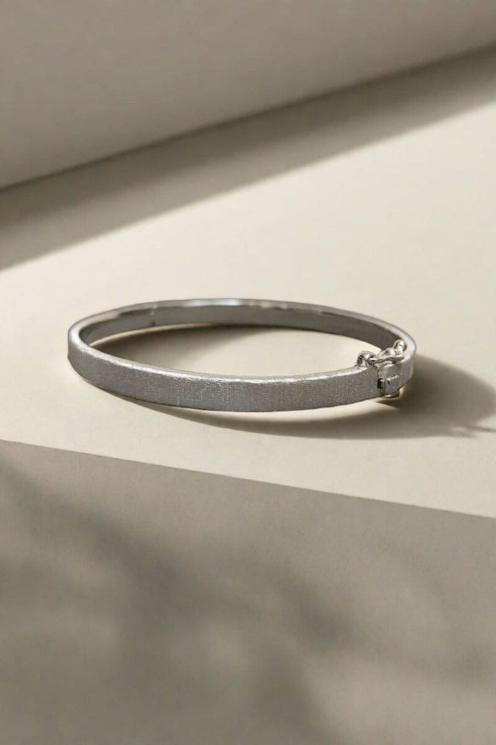 Rhodium Brushed Bangle - Mildred Hoit