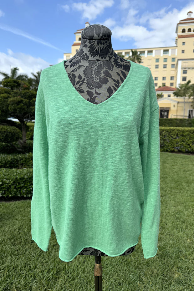 Solid Cotton V-Neck in Green available at Mildred Hoit in Palm Beach.