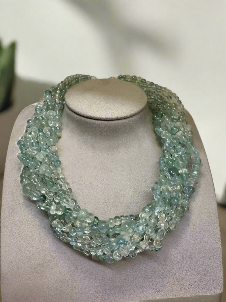 Aquamarine and Blue Tourmaline Necklace available at Mildred Hoit in Palm Beach.