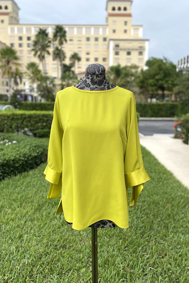 Emmelle Silk Blouse with Satin Tie Cuff in Goldenrod available at Mildred Hoit in Palm Beach.
