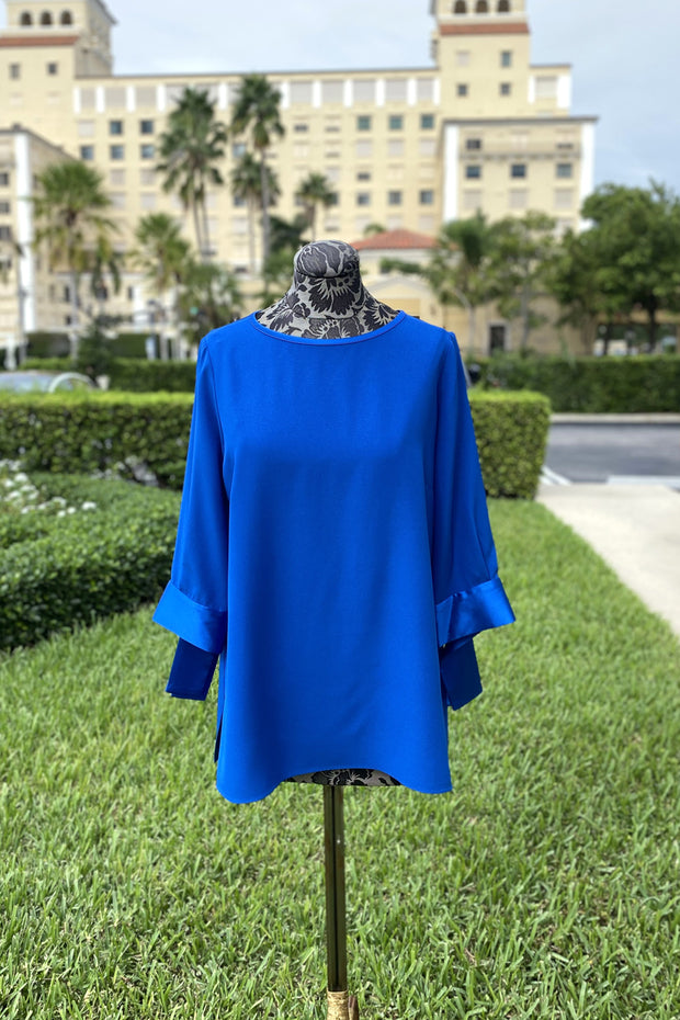Emmelle Silk Blouse with Satin Tie Cuff in Iris available at Mildred Hoit in Palm Beach.