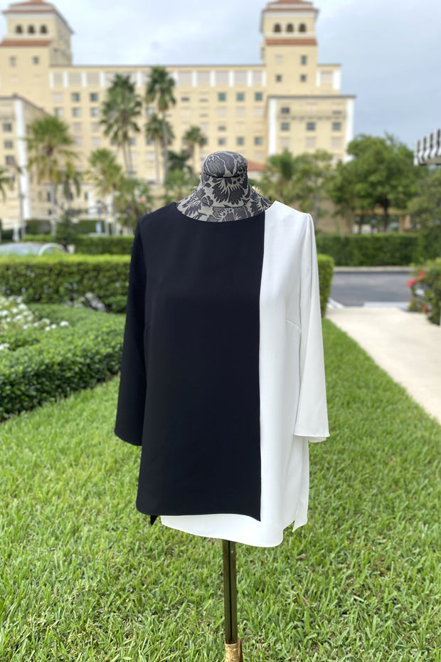 Emmelle Layered Front Luxurious Crepe Tunic in Black and Pearl available at Mildred Hoit in Palm Beach.