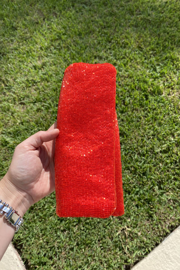 Tiana Designs Long Beaded Clutch in Red available at Mildred Hoit in Palm Beach.