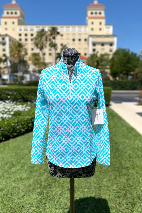 Turquoise Trelis UPF 50+ Sport Top available at Mildred Hoit in Palm Beach.