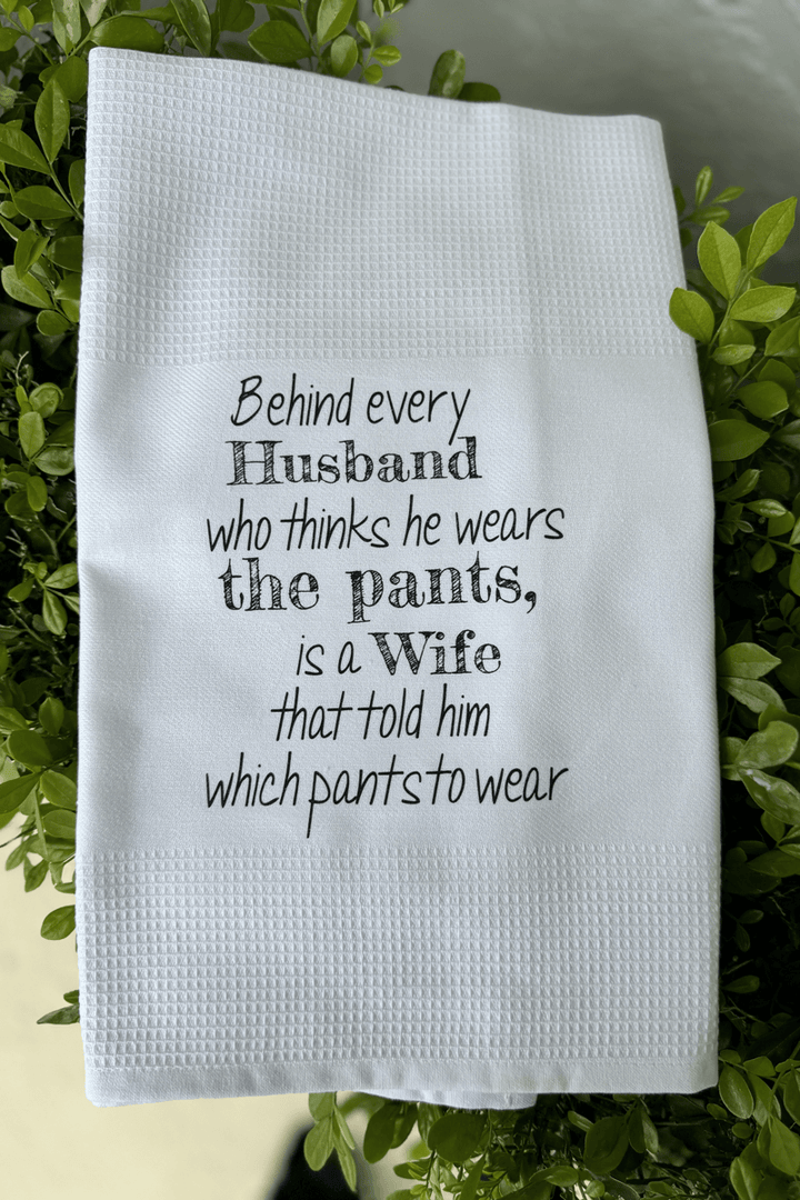 'Behind Every Husband..." Dish Towel available at Mildred Hoit in Palm Beach.