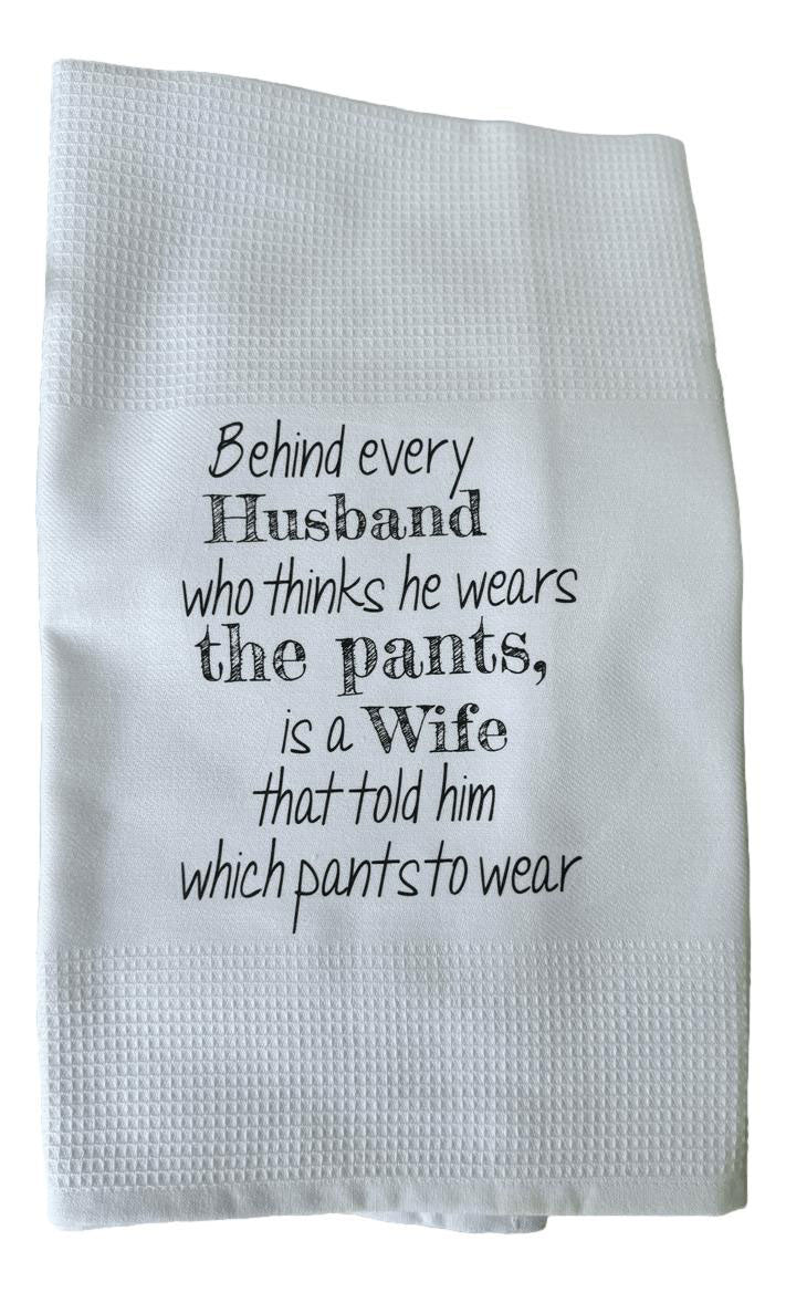 'Behind Every Husband..." Dish Towel - Mildred Hoit