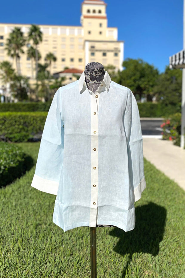 Baby Blue and Silver Trim Linen Button Down Blouse available at Mildred Hoit in Palm Beach. 