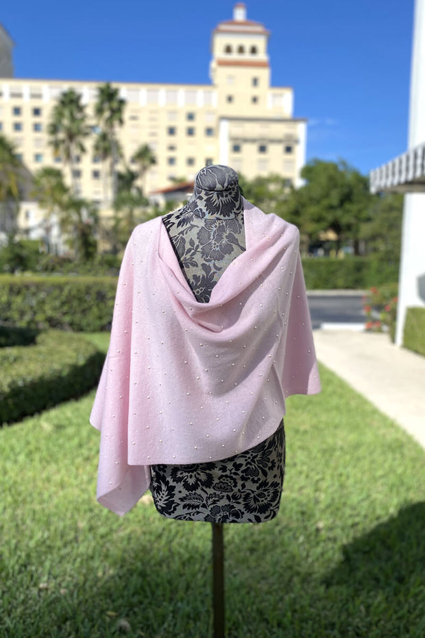 Pink Cashmere Topper with Pearl Details available at Mildred Hoit in Palm Beach.