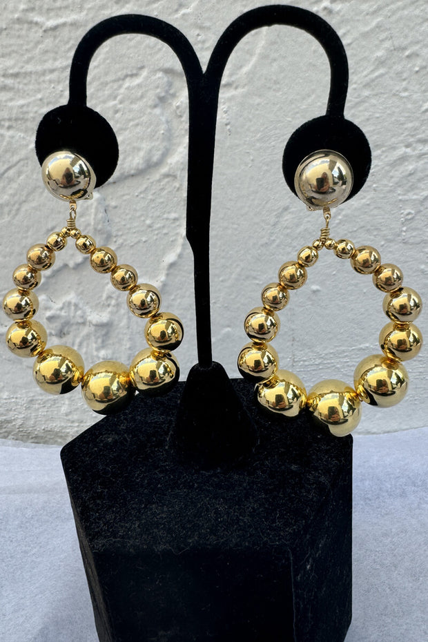 Kenneth Jay Lane Gold Oval Drop Earrings available at Mildred Hoit in Palm Beach.