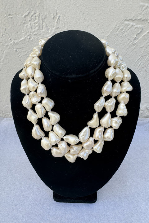 Kenneth Jay Lane Triple Strand Baroque Pearl Necklace available at Mildred Hoit in Palm Beach.