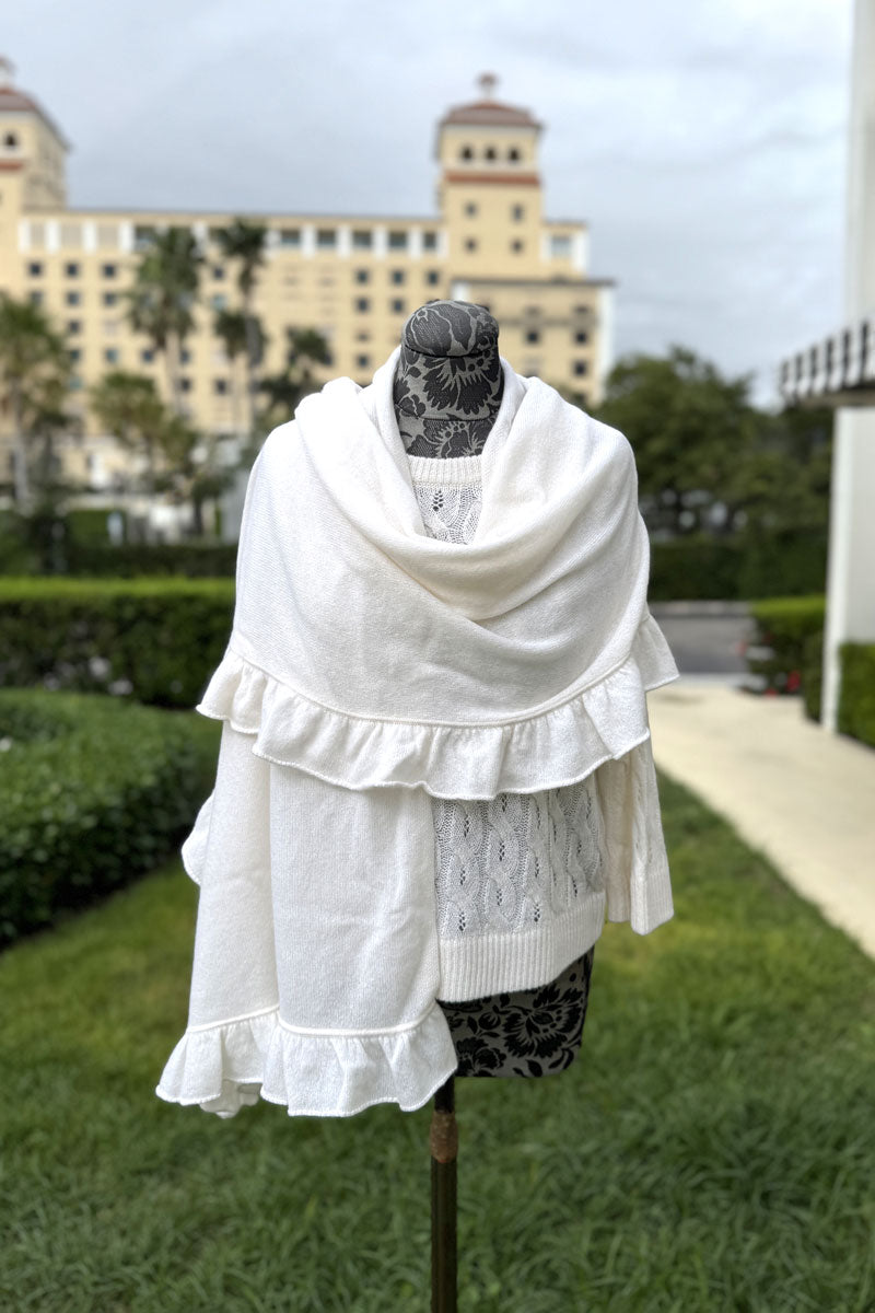 Kinross Ruffle Trim Wrap in Ivory available at Mildred Hoit in Palm Beach.