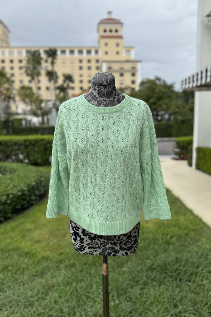 Kinross 3 Quarter Sleeve Pointelle Cable Crew Sweater in Celadon available at Mildred Hoit in Palm Beach.