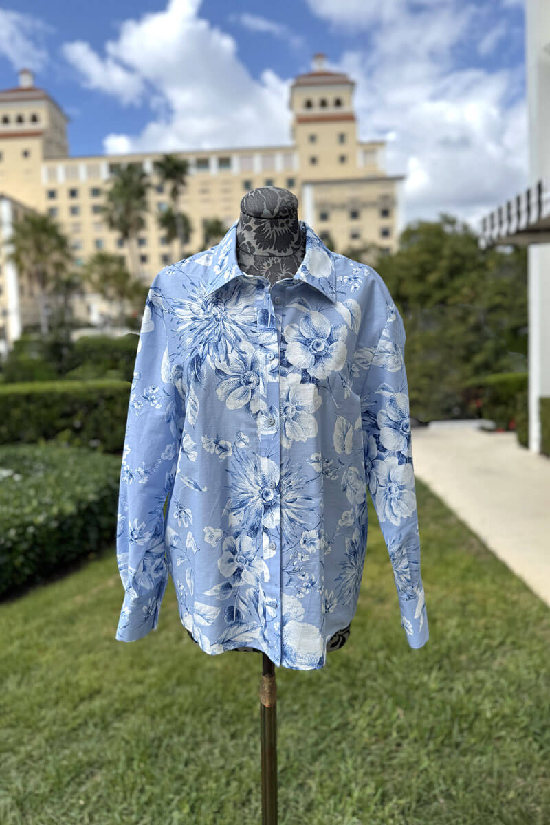 Lavi Cotton Celeste Blouse in Light Blue available at Mildred Hoit in Palm Beach.