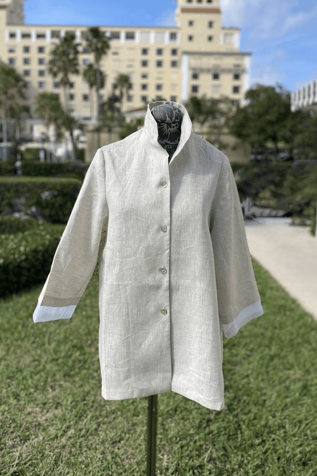Button Down Linen Blouse in Beige available at Mildred Hoit in Palm Beach.