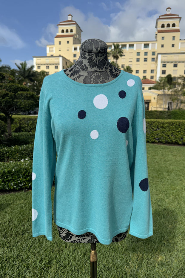 Turquoise Knit Sweater with Polka Dot Details available at Mildred Hoit in Palm Beach.