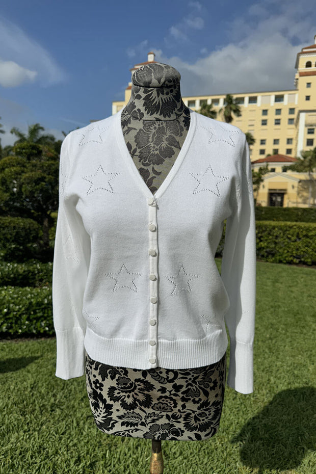 White Cardigan with Heart Detail available at Mildred Hoit in Palm Beach.