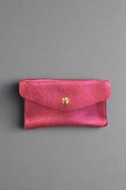 Metallic Pink Coin Wallet available at Mildred Hoit in Palm Beach.