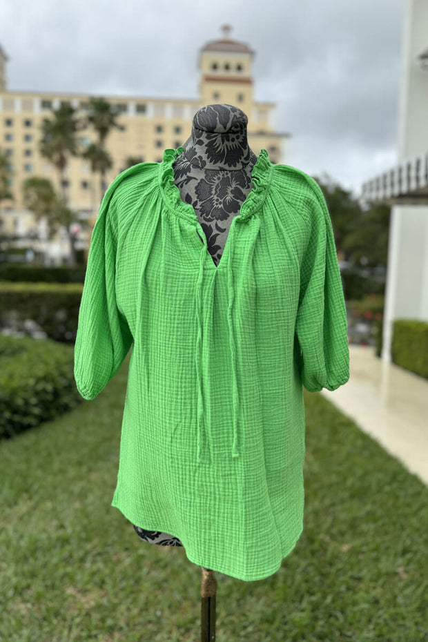 Ruffle Neck Cotton Blouse in Emerald available at Mildred Hoit in Palm Beach.