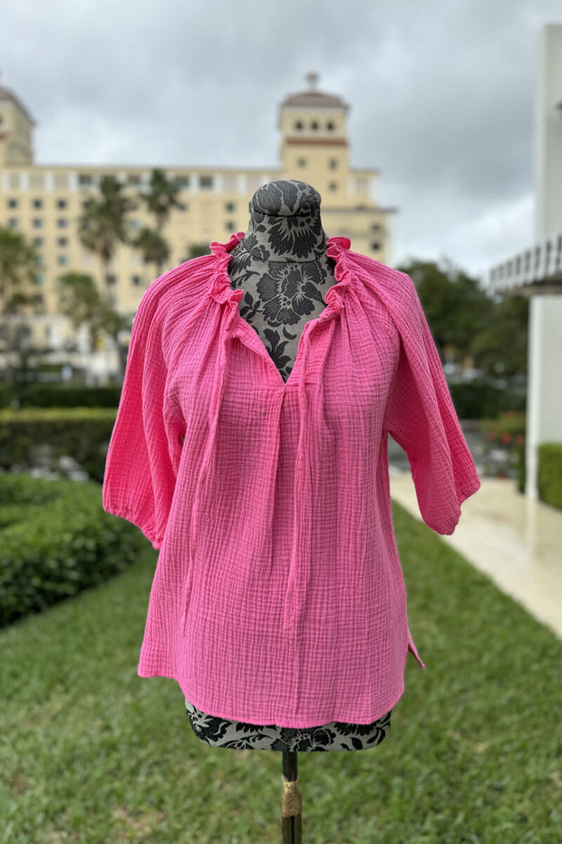 Ruffle Neck Cotton Top in Neon Pink available at Mildred Hoit in Palm Beach.