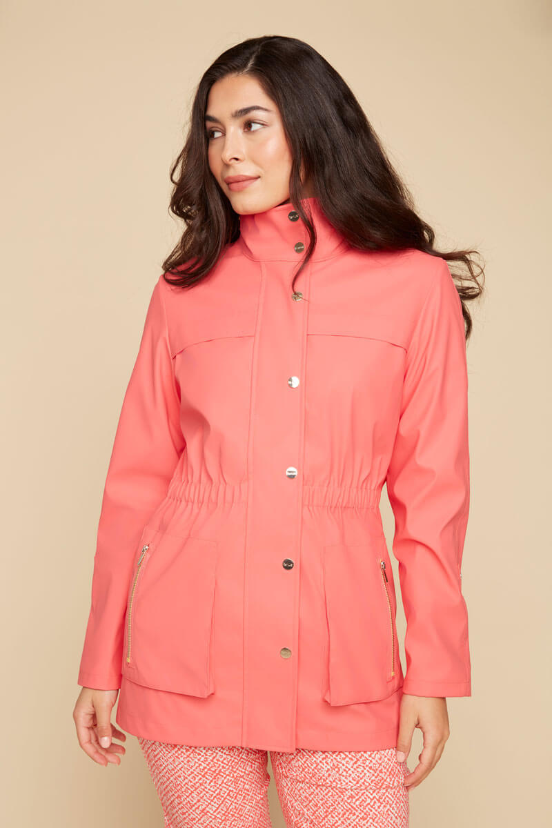 Renuar Raincoat in Corally available at Mildred Hoit in Palm Beach.