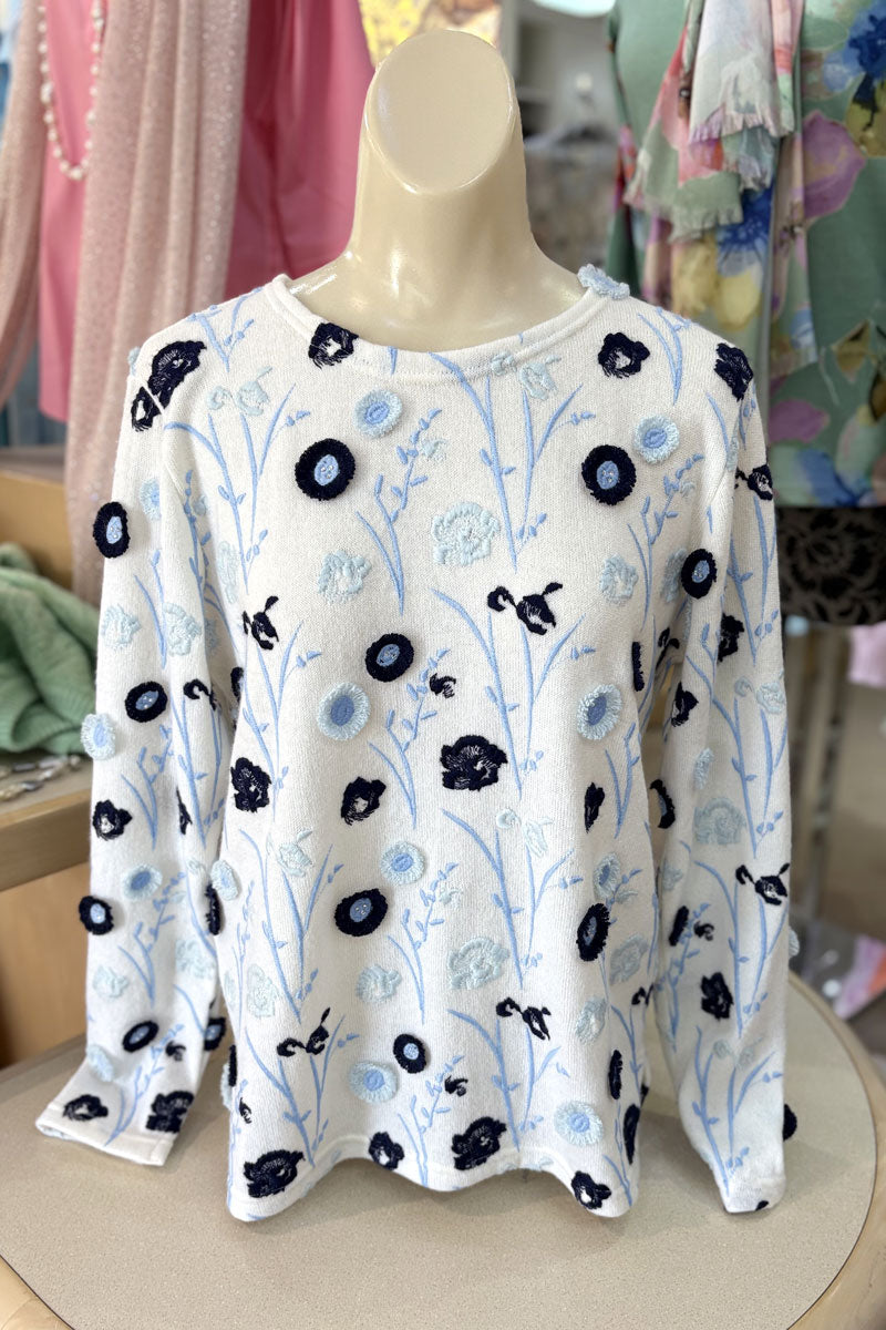 Richard Grand Embroidered Sweater with Blue Flowers available at Mildred Hoit in Palm Beach.