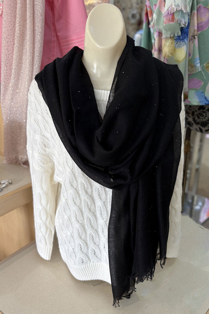 Richard Grand Black Scarf with Sequins available at Mildred Hoit in Palm Beach.