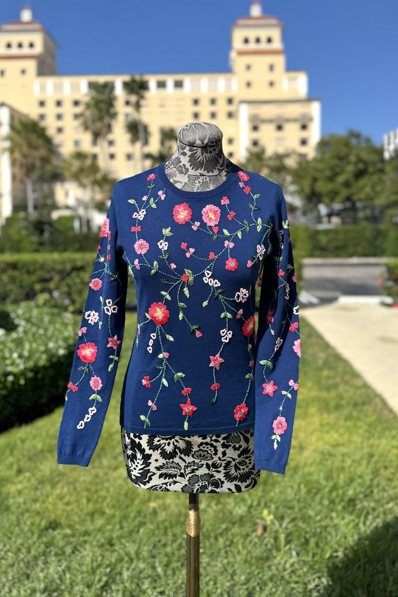 Richard Grand Navy Cotton Sweater with Pink Floral Detail available at Mildred Hoit in Palm Beach.