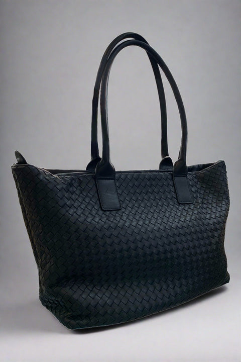Woven Leather Tote available at Mildred Hoit in Palm Beach.