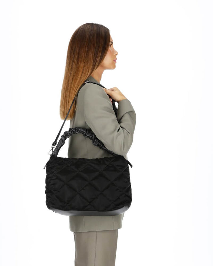 Model wearing Quilted Large Black Handbag