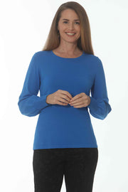 Jeweled Neck Ribbed Cuff Sweater in Blue available at Mildred Hoit in Palm Beach.