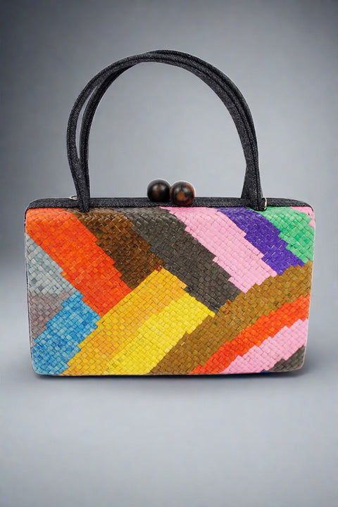 Multicolor Woven Straw handbag available at Mildred Hoit.